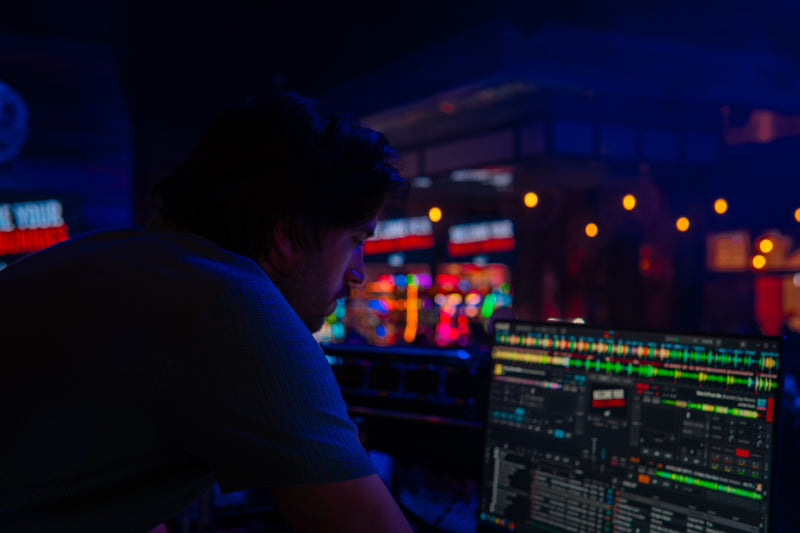 DJ controller lit in blue during a Treetop event